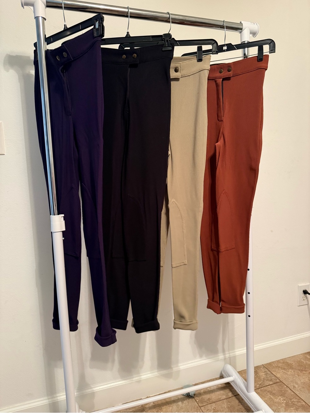 American Apparel Riding Pants IYKYK. Black, Tan, Rust and dark purple.